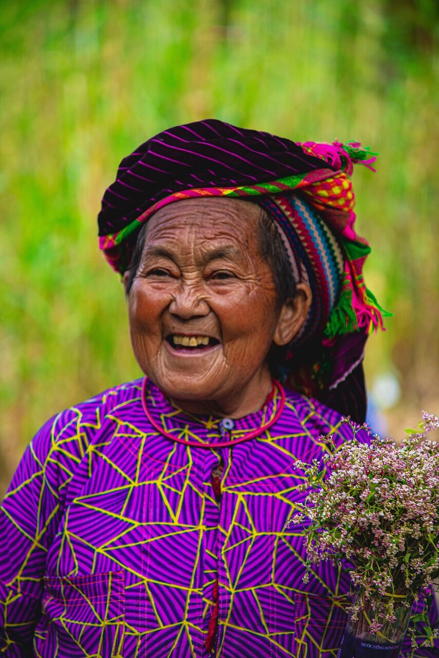 H'Mông women in colorful traditional costumes at Meo Vac Sunday market
